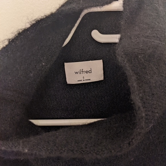 Black mockneck sweater with tie. - Picture 2 of 4